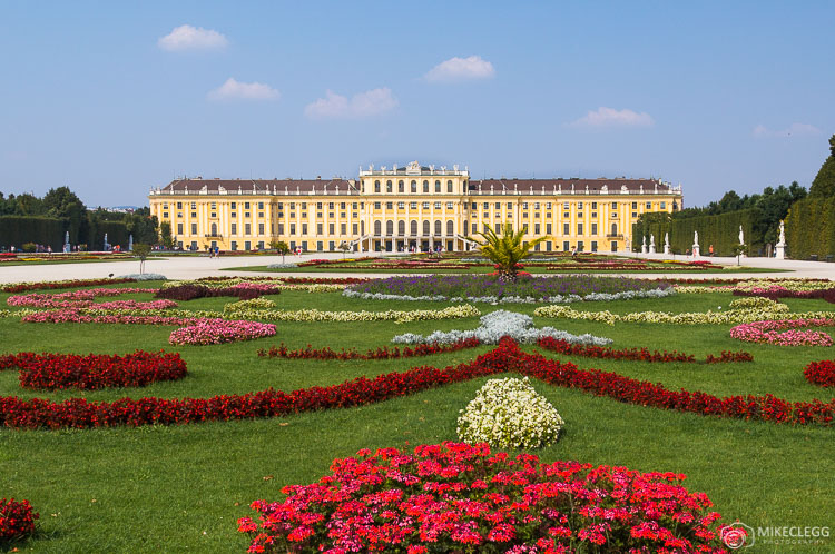 Schönbrunn Palace in the summer with flowers in the gardens