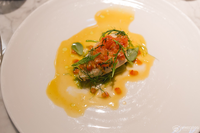 John Dory with tomatoes, herbs and butter