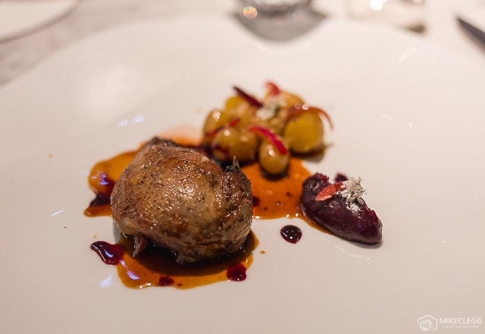 Pigeon from Les Costieres with cherry, onions, potatoes and coriander