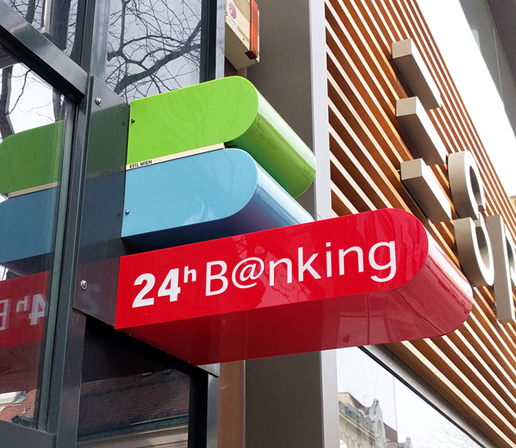 Blue and Green ATM signs in Vienna, Austria