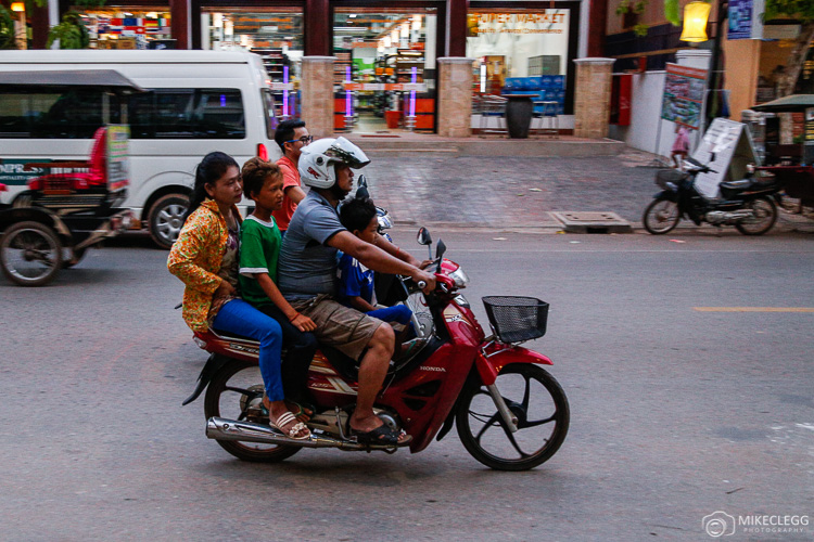 Groups of people on bikes in Cambodia