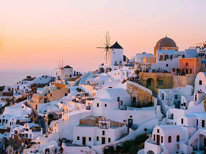 Santorini at sunset - tom-grimbert-unsplash