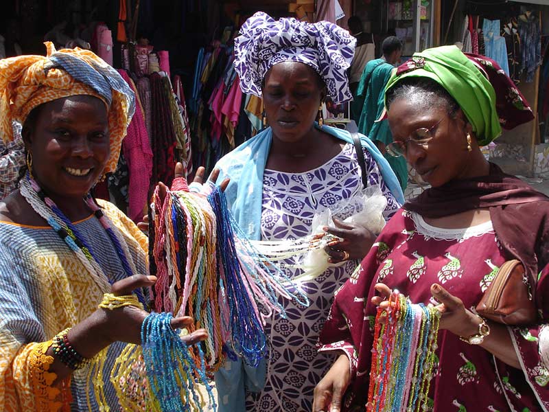 Colourful bead merchants at Dakar market, photo by BobbiLe Ndiaye