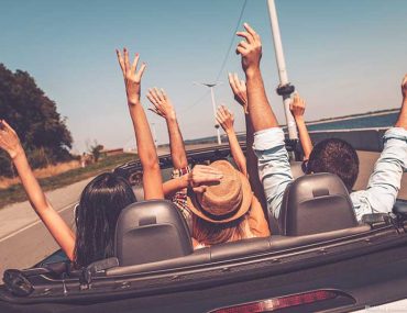 People in a car - off on a trip