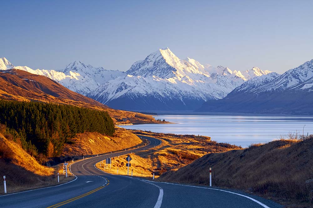 Mount Cook and road alongside Lake Pukaki in New Zealand