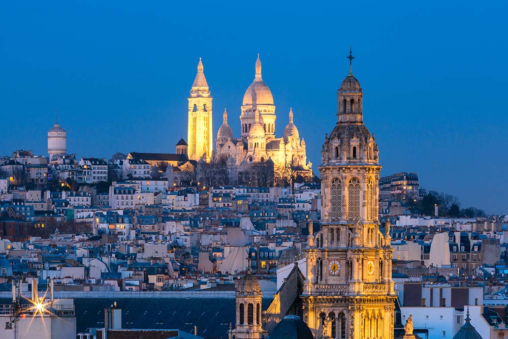 Rooftop views of Sacre-Coeur Basilica at night