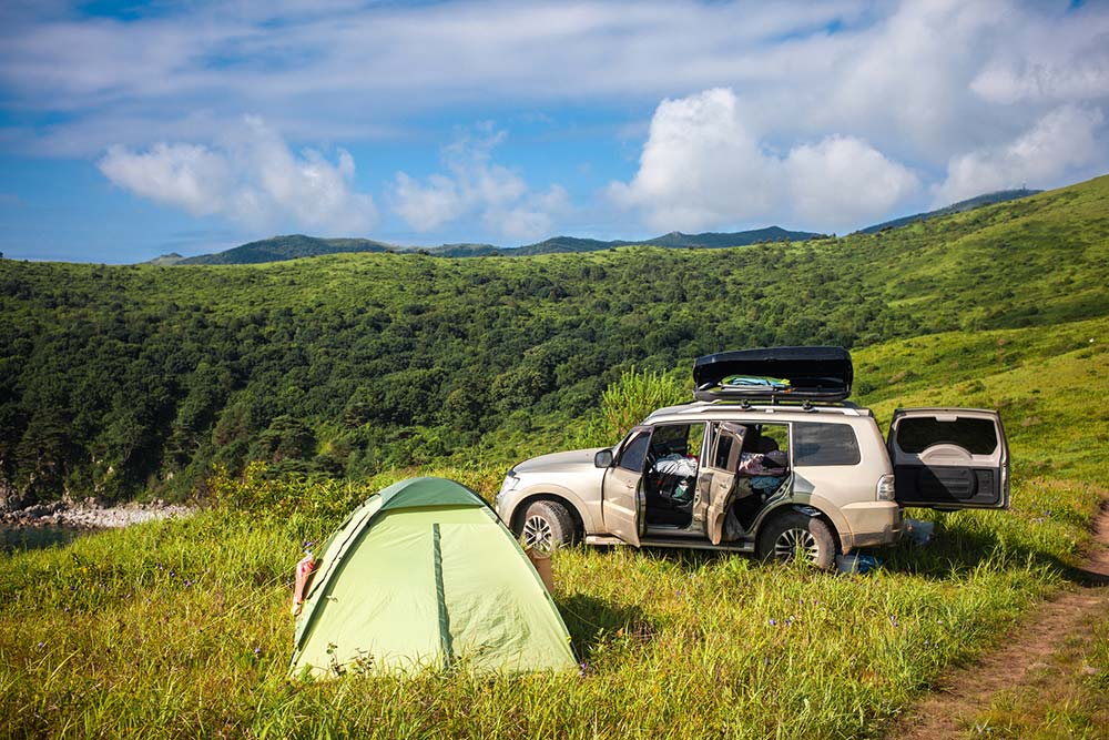 Camping with hill views