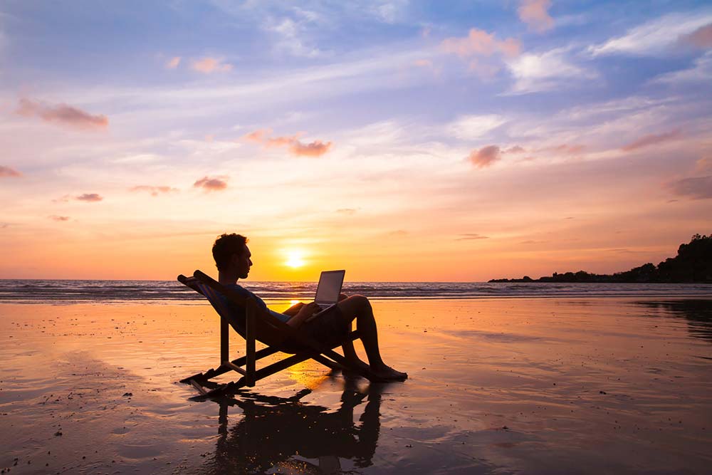 Man on a deckchair by the sea